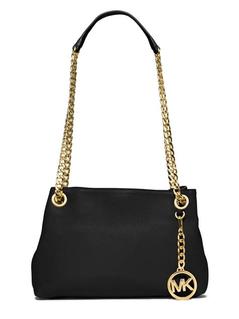 michael kors bag black with gold chain|Michael Kors black signature handbag.